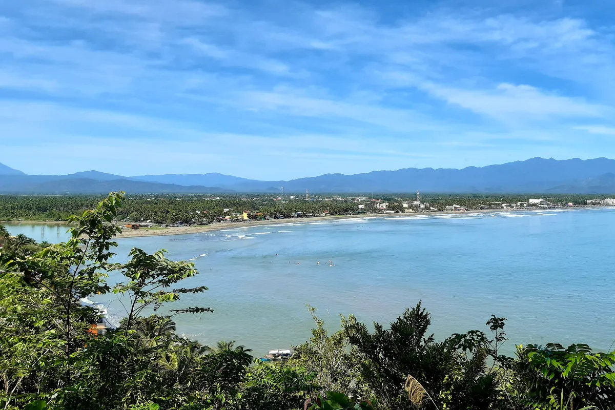 Baler Bay and the Sierra Madre foothills seen from above the town