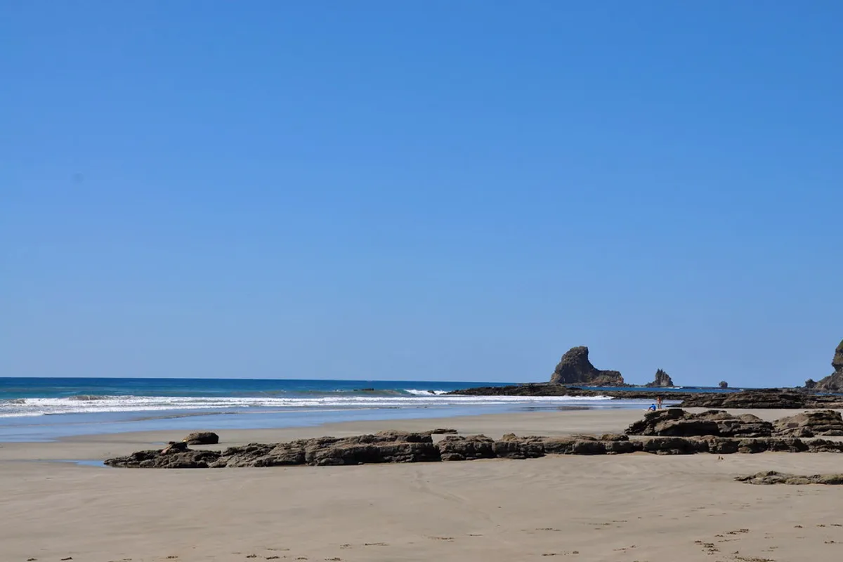 Playa Maderas, a forested surf beach near San Juan del Sur, Nicaragua