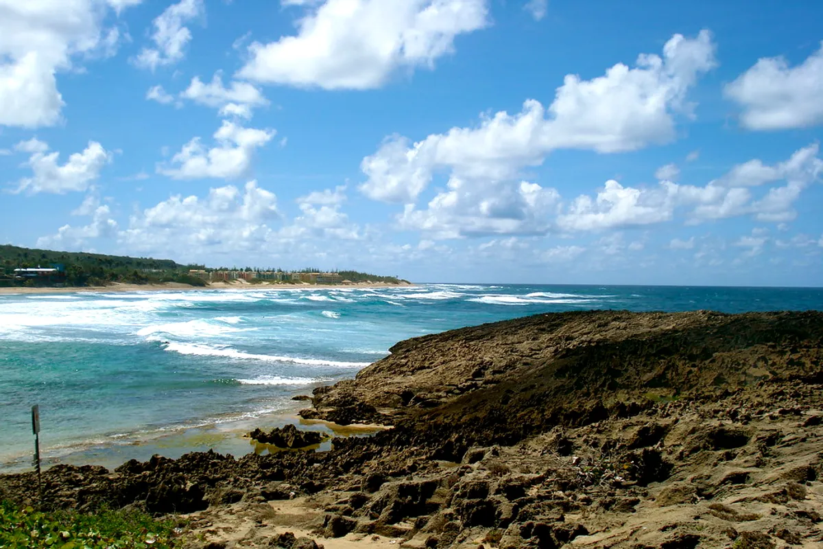 Rocky headland looking along the coast towards Jacó beach