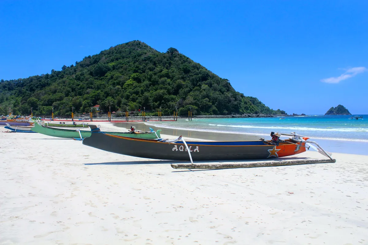 Fishing boats on the white sand at Selong Belanak, near Kuta Lombok