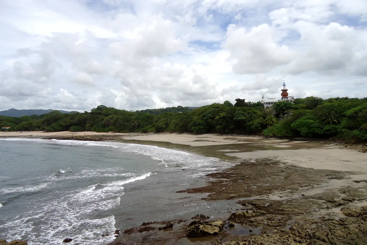 A quiet curve of beach backed by forest near Nosara, Costa Rica