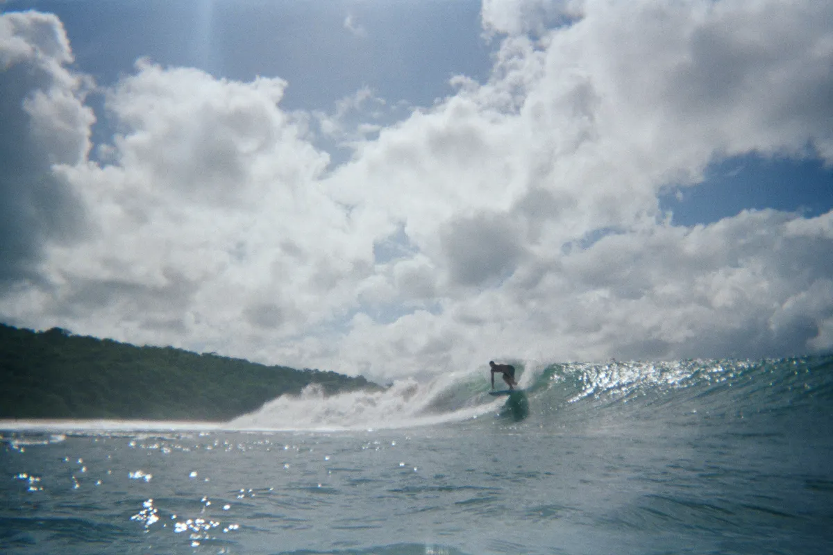 A surfer on a wave at Popoyo, Nicaragua