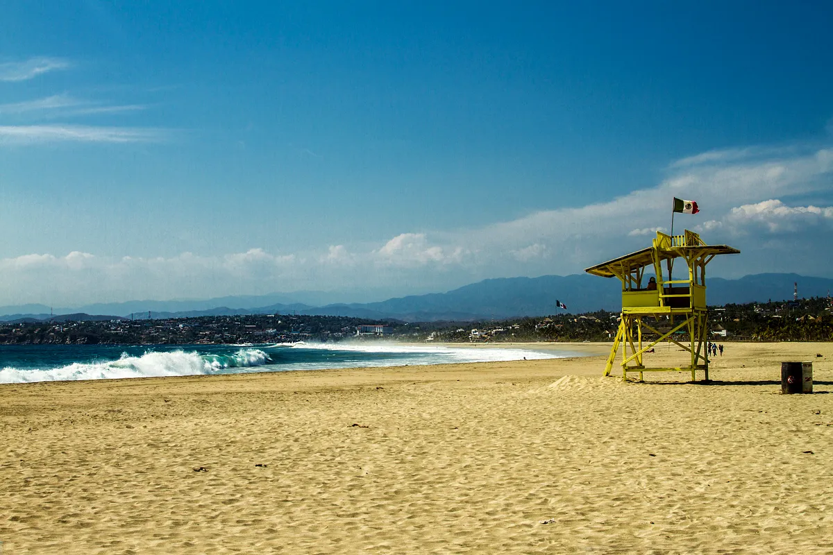 Lifeguard tower on the sand at Playa Zicatela, Puerto Escondido